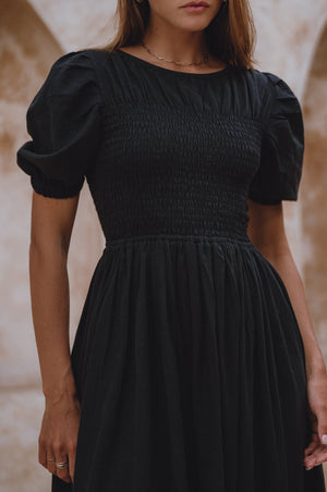 
                  
                    Sophie Smocked Linen Midi Dress
                  
                