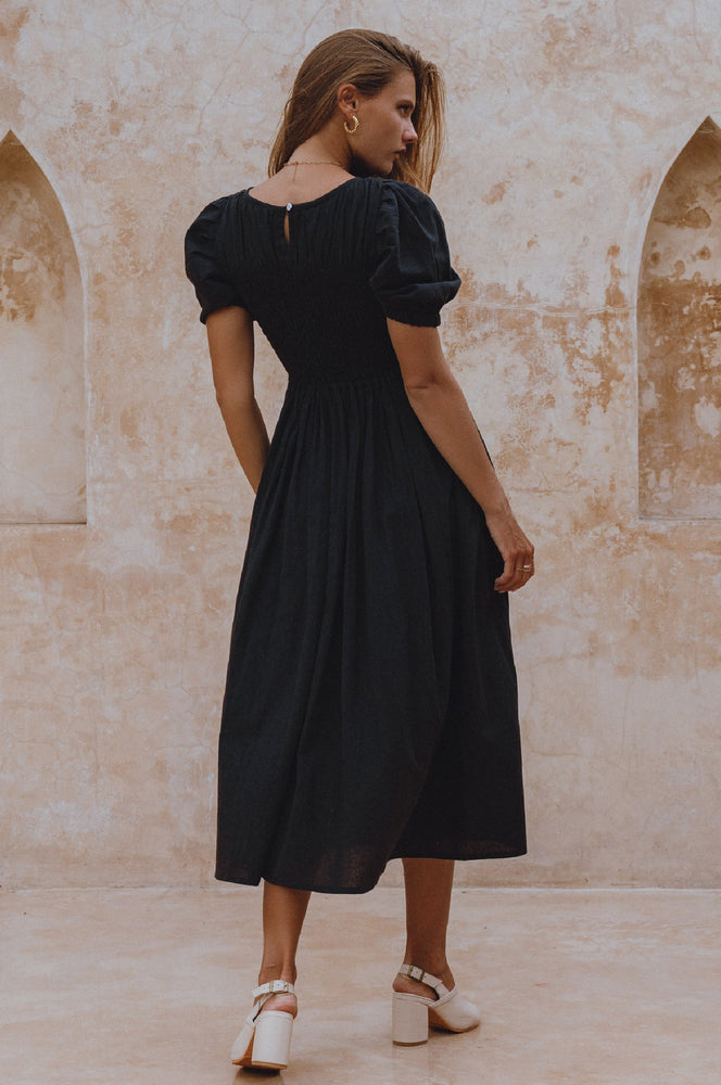 
                  
                    Sophie Smocked Linen Midi Dress
                  
                