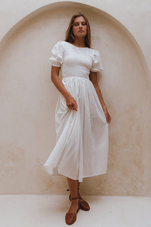 
                  
                    Sophie Smocked Linen Midi Dress
                  
                