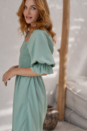 
                  
                    Almeria Smocked Midi Linen Dress
                  
                