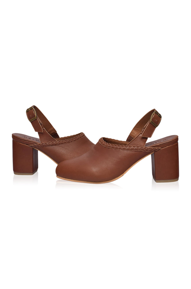 
                  
                    Savage Leather Slingback Heels
                  
                